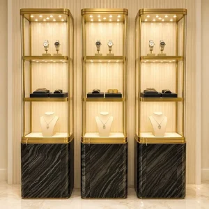 Jewelry Display Cabinet Brushed Gold Stainless Steel Black Marble Base for High end Jewelry Retailers