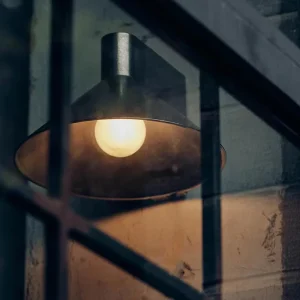 Modern Outdoor Wall Lamp with Black Metal Shade and Brass LED Light Source for Hotel and Garden Decoration