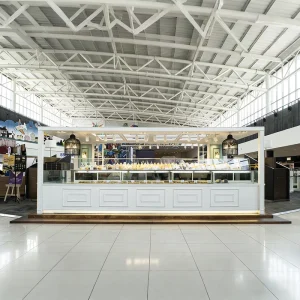 Open Concept Pop Up Bakery Display LED Lighting High Gloss Lacquer Panels Ultra Clear Glass Zone Customizable Metal LED Strips